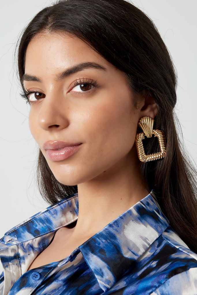 Statement earrings square