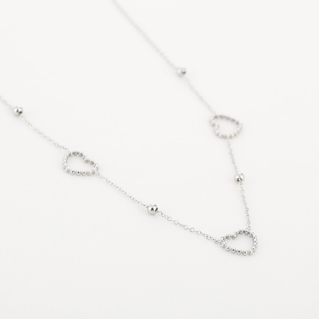 Necklace three hearts dots